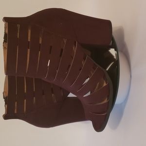 Pair of ankle boots in a size 9. Burgundy color.  Open peep toe. EUC